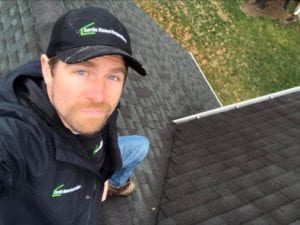 A Man Taking a Selfie at the Top of a Roof